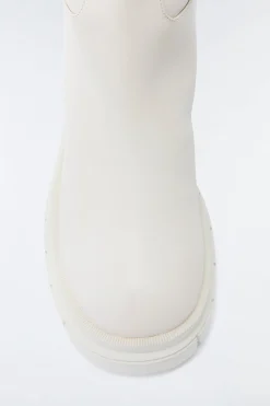 COMMANDER shearling-lined lug sole (R) Leather boot for women