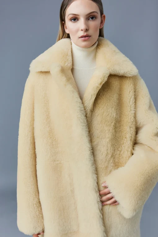 ETIENNE Shearling coat with belt